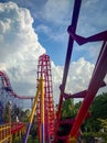 Roller coaster and the clouds Royalty Free Stock Photo