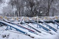 Roller coaster cowered with snow in amusement park in winter Royalty Free Stock Photo