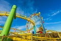 Roller Coaster and Ferris Wheel at Pacific Park on the Pier