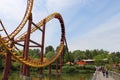 Roller coaster Goudrix close up on the train in the loop at Park Asterix, Ile de France, France