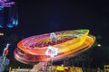 Roller coaster in motion, amusement park at night. Long exposure Royalty Free Stock Photo