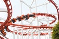 Roller coaster rail loop with motion blur player over cloudy sky Royalty Free Stock Photo