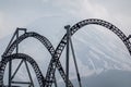 Roller coaster railqay track with view of Mt. Fuji or Fuji-san, Japan Royalty Free Stock Photo