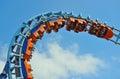 Roller coaster ride filled with thrill seekers Royalty Free Stock Photo