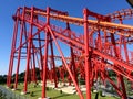 Roller Coaster Under a Blue Sky. Energylandia. Zator, Poland Royalty Free Stock Photo