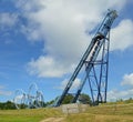 Roller coaster Wipeout ride filled with thrill seekers