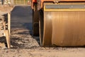 roller compacts asphalt on the road during the construction of the road. compaction of the pavement in road construction. rink Royalty Free Stock Photo