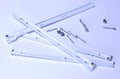 Roller guides for installation during furniture assembly, background.