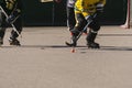 a roller hockey player breaking out with the puck