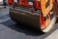 Roller machine working on the asphalt road construction. Royalty Free Stock Photo