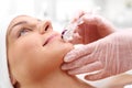 Roller microneedle mesotherapy in the wellness clinic. Royalty Free Stock Photo