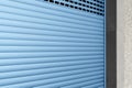 Roller shutter gate. Metal roller garage door as background. Automatic electric roll-up garage gate. Garage with white rolling Royalty Free Stock Photo