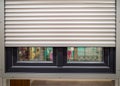 Roller shutters installed on a plastic window Royalty Free Stock Photo