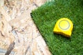 Roller tape lying on the artificial turf roll lying on the osb sheet.