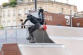 Rollerbladers doing tricks at a local skate park in Bordeaux, France