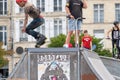 Rollerbladers doing tricks at a local skate park in Bordeaux, France