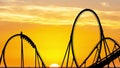 Rollercoaster silhouette animation loop at sunset
