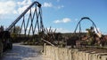 Rollercoaster "Kondaa" with train on airtime hill in the amusement park "Walibi Belgium"