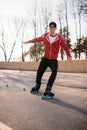 Rollerskater, rollerskating trick exercise in park Royalty Free Stock Photo