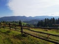 Rolling countryside around a country meadow. Picturesque day and gorgeous scene. Beautiful mountains landscape. . Carpathian