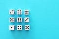 Rolling Dices over blue background. Casino gambling concept Royalty Free Stock Photo