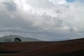 Rolling Farm Fields with Clouds Royalty Free Stock Photo