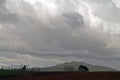 Rolling Farm Fields and Clouds Royalty Free Stock Photo