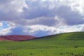 Rolling Farm Fields with Clouds Royalty Free Stock Photo