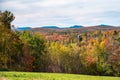 Rolling forested hills in Vermont on a partly cloudy autumn day Royalty Free Stock Photo
