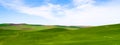 Rolling Green Hills Agricultural Land Partly Cloudy Blue Sky