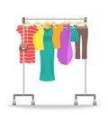 Rolling hanger rack with women clothes collection