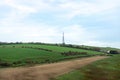 Rolling hill and a pylon near the new road heading towards Weymouth, Dorset, UK Royalty Free Stock Photo