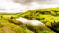 The Rolling Hills and Grasslands in the Nicola Valley near Merritt under cloudy skies Royalty Free Stock Photo