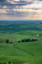 Rolling hills of the Palouse morning with sunrays through the clouds Royalty Free Stock Photo