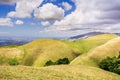 Rolling hills in south San Francisco bay area; east San Francisco bay area visible in the background; San Jose, California Royalty Free Stock Photo