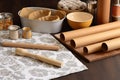 rolling pin, dough, and baking pans on the table for hands-on cookie baking workshop