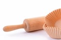 Rolling pin and parchment baking cups Royalty Free Stock Photo