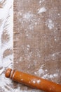 Rolling pin on sackcloth and sprinkled flour