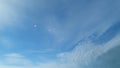 Rolling puffy white layered clouds. Sun ligth, sky and altostratus cloud. Timelapse. Royalty Free Stock Photo