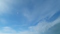 Rolling puffy white layered clouds. Sun ligth, sky and altostratus cloud. Timelapse. Royalty Free Stock Photo