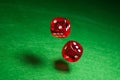 Rolling red dice Royalty Free Stock Photo