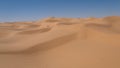 Rolling sand dunes in the Sahara desert Royalty Free Stock Photo