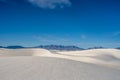 Rolling Sand Dunes And San Andres Mountains Sit Under A Partially Cloudy Sky Royalty Free Stock Photo