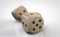 Rolling two dice on a white background