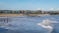 Rolling waves and Beach Huts Southwold Royalty Free Stock Photo