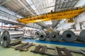 Rolls of aluminum and crane in production shop of plant Royalty Free Stock Photo