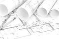 Architectural background with plan, blueprints rolls and drawing compass Royalty Free Stock Photo