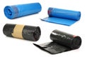Rolls of blue and black garbage bags Royalty Free Stock Photo