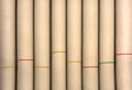 Rolls of brown paper with plastic band texture for background Royalty Free Stock Photo