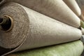 A rolls of carpet for sale in a shop store.